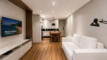 Premium Apartment, 2 Bedrooms | Living room | Flat-screen TV