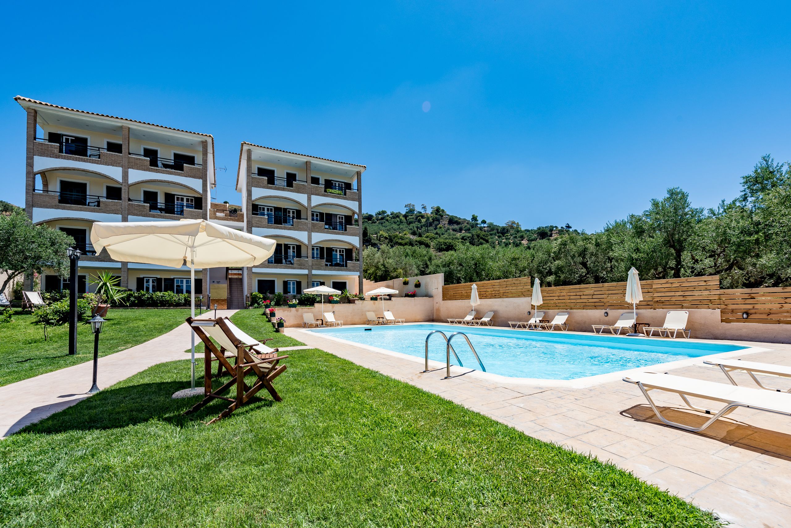 Outdoor pool, pool umbrellas, pool loungers