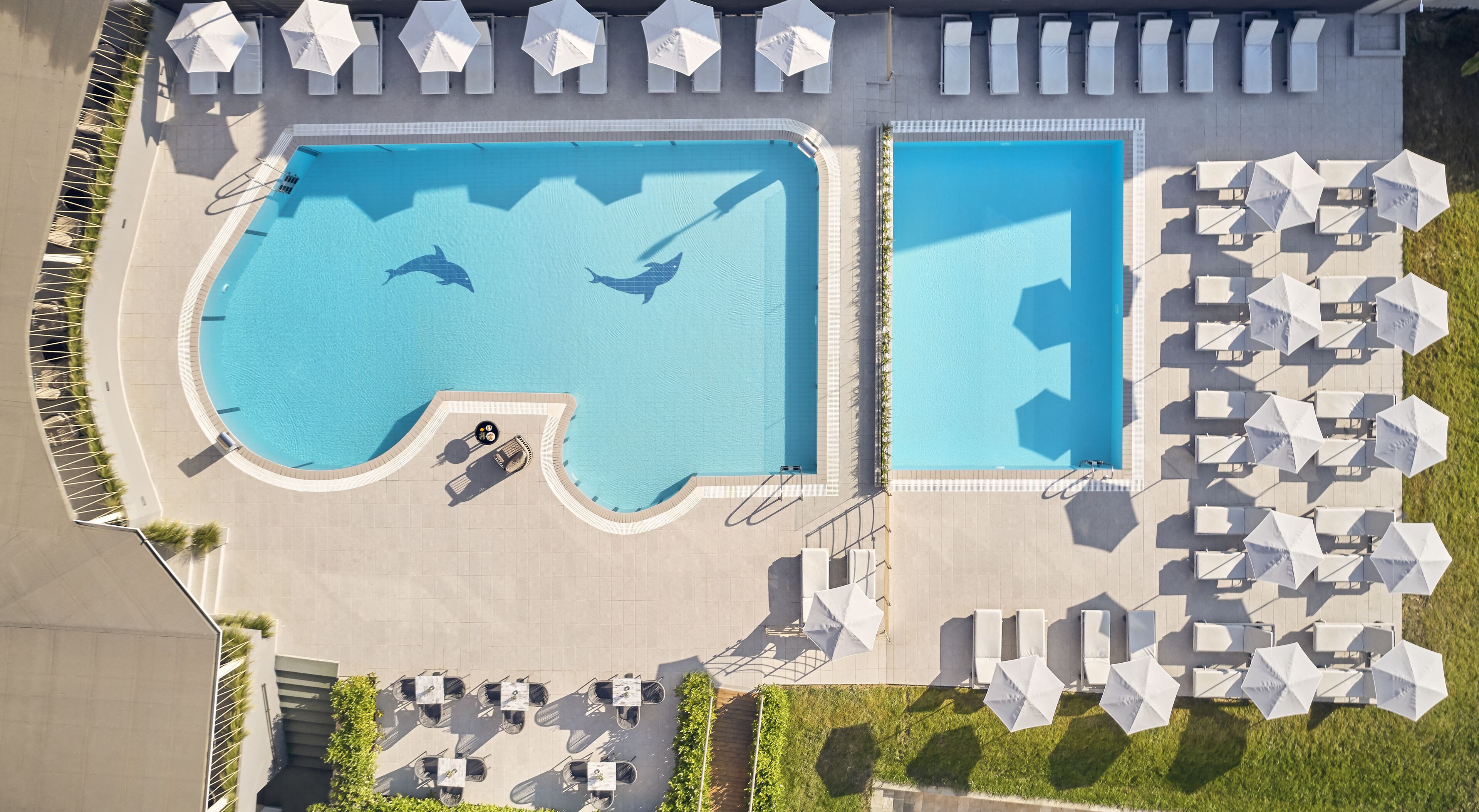 2 outdoor pools, pool umbrellas, pool loungers