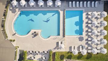 2 outdoor pools, pool umbrellas, pool loungers