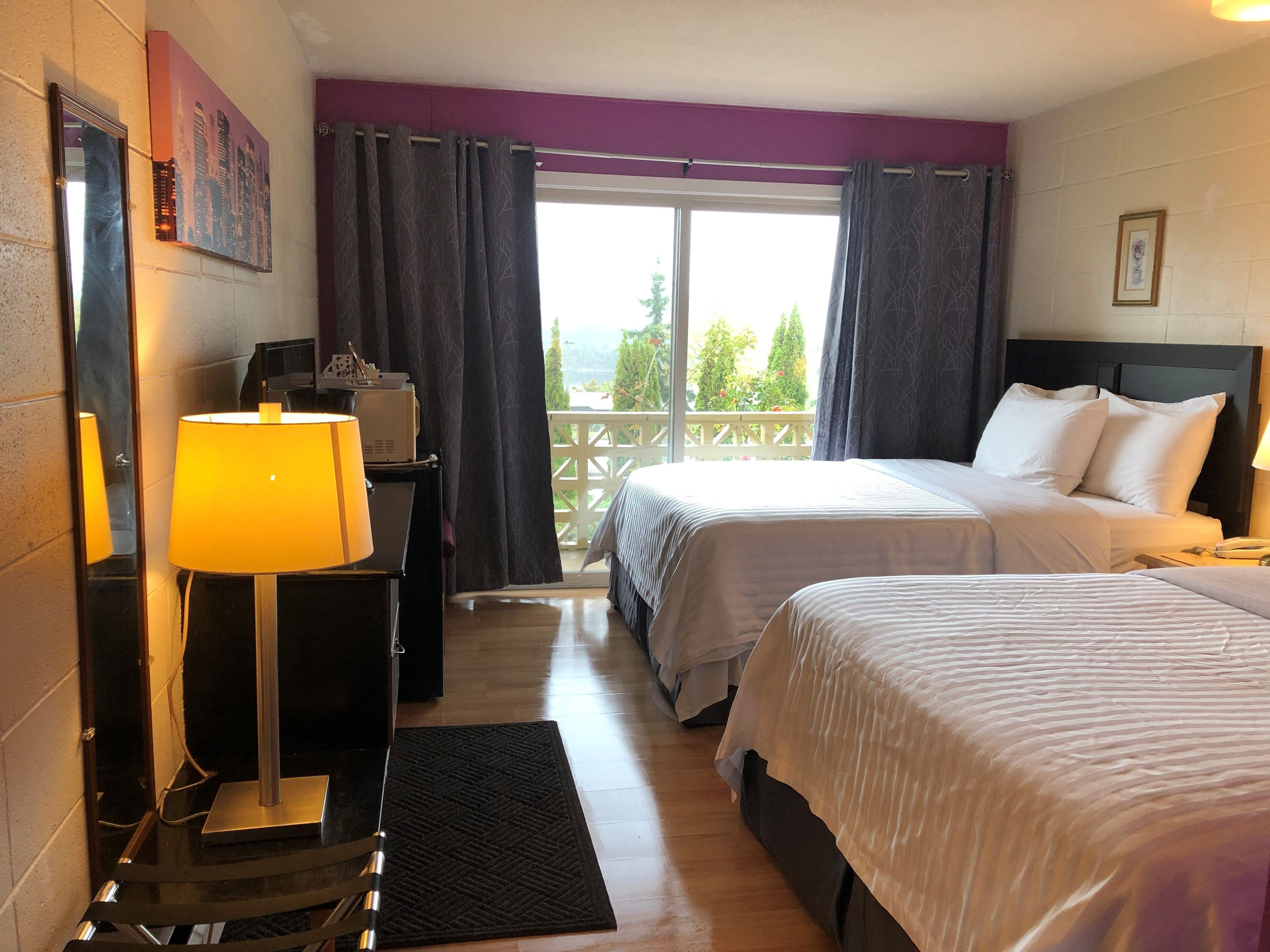 Deluxe Room, 2 Queen Beds, Balcony, Sea View | Frette Italian sheets, premium bedding, pillowtop beds, blackout drapes