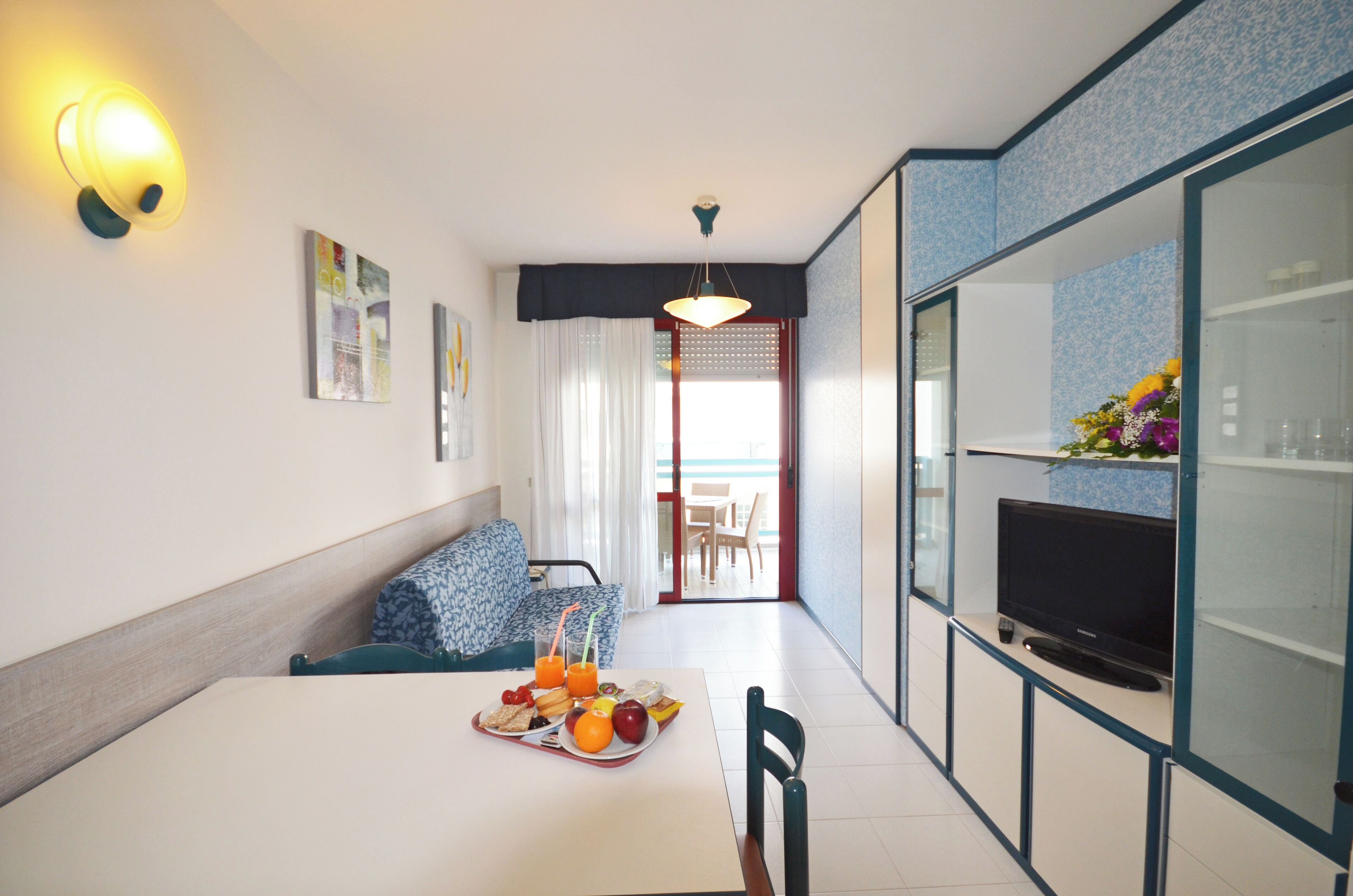 Apartment, Balcony | Living area | 50-cm flat-screen TV with satellite channels