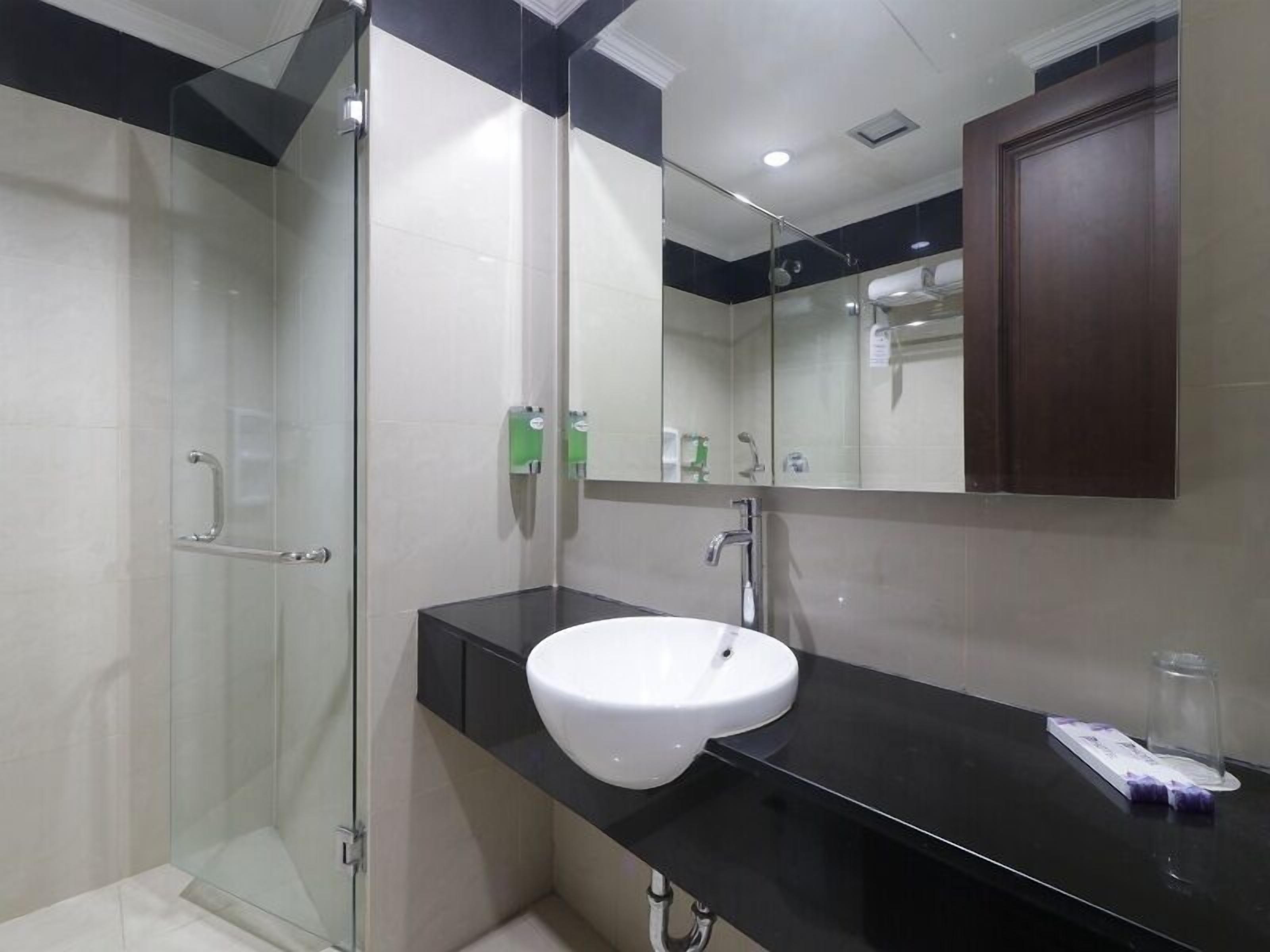 Shower, free toiletries, slippers, towels