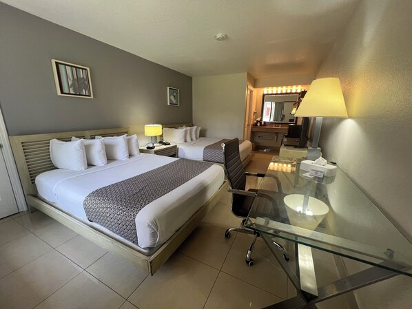 Deluxe Double Room, 2 Queen Beds | Desk, blackout drapes, iron/ironing board, free cribs/infant beds