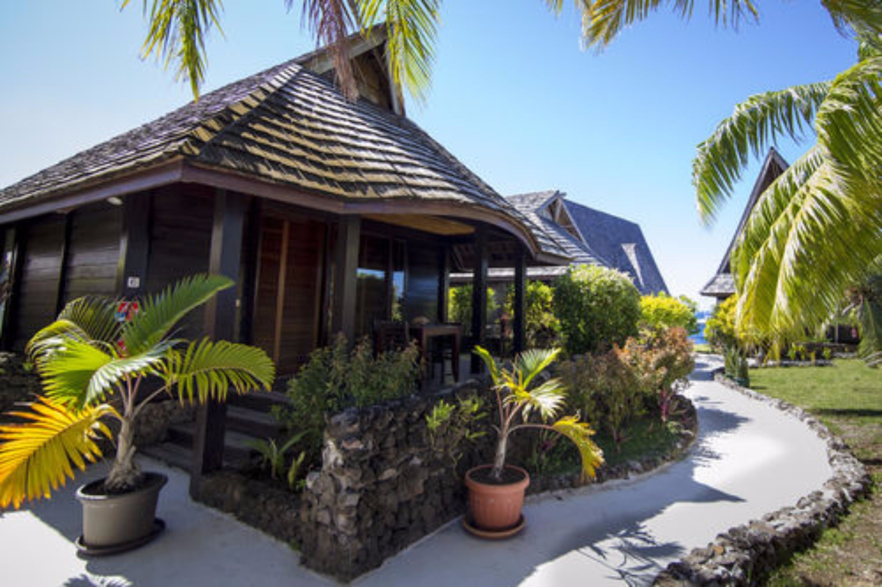 deluxe bungalow, ensuite, garden view | desk, iron/ironing board, free cots/infant beds, free rollaway beds