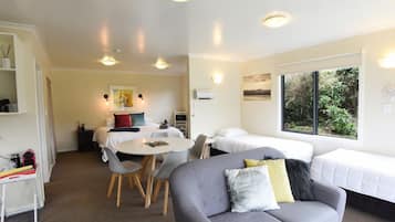 Cabaña Deluxe (Korimako) | Área de sala de estar