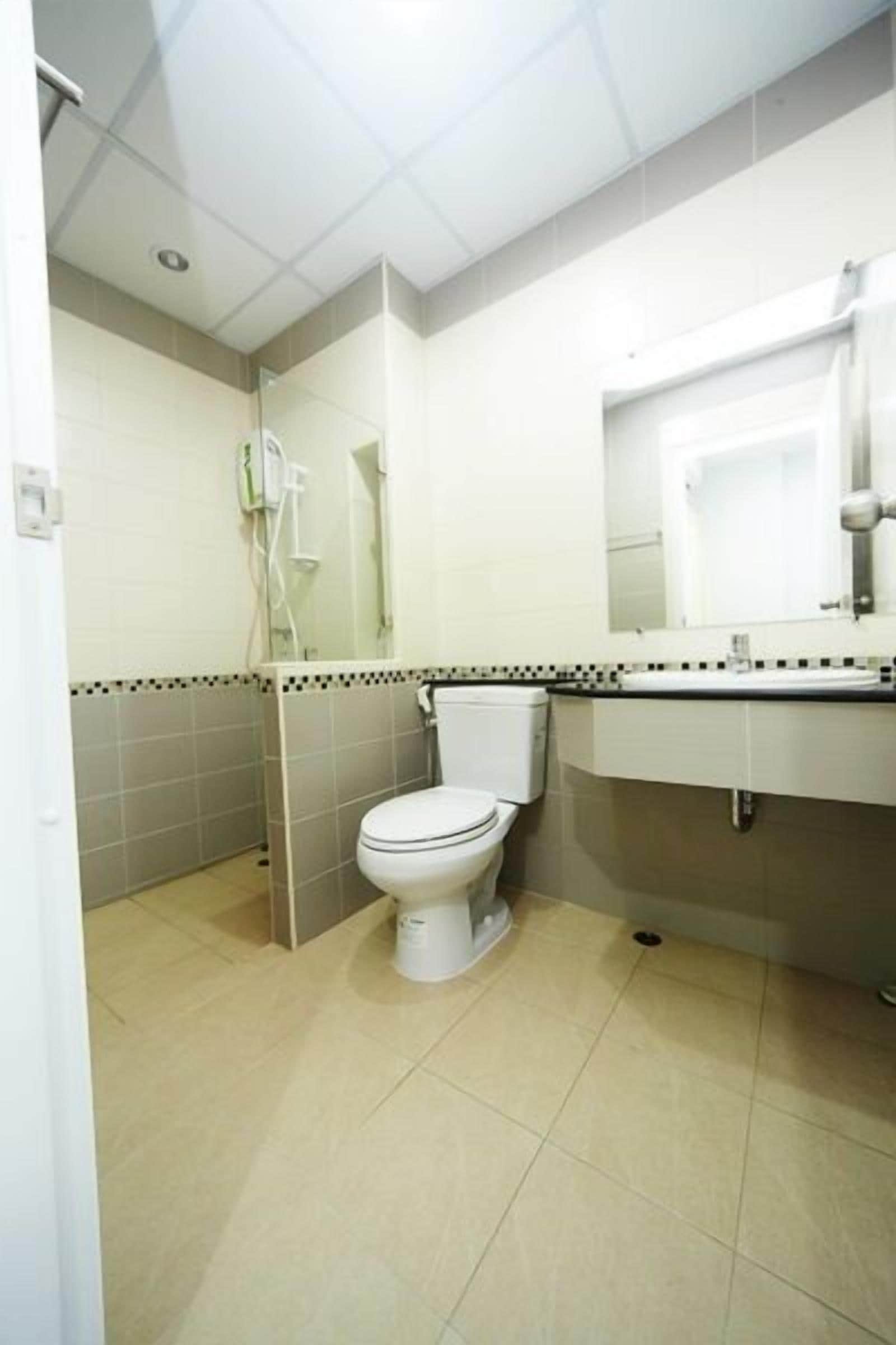 standard twin bed with balcony | bathroom | shower, free toiletries, hair dryer, towels