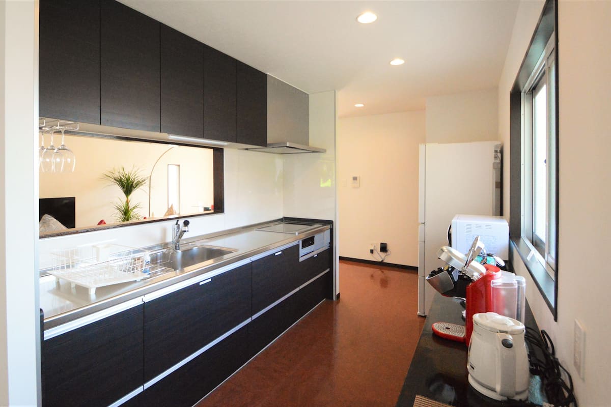 premium suite, 2 bedrooms, hill view | private kitchen | full-sized fridge, microwave, espresso maker, coffee/tea maker