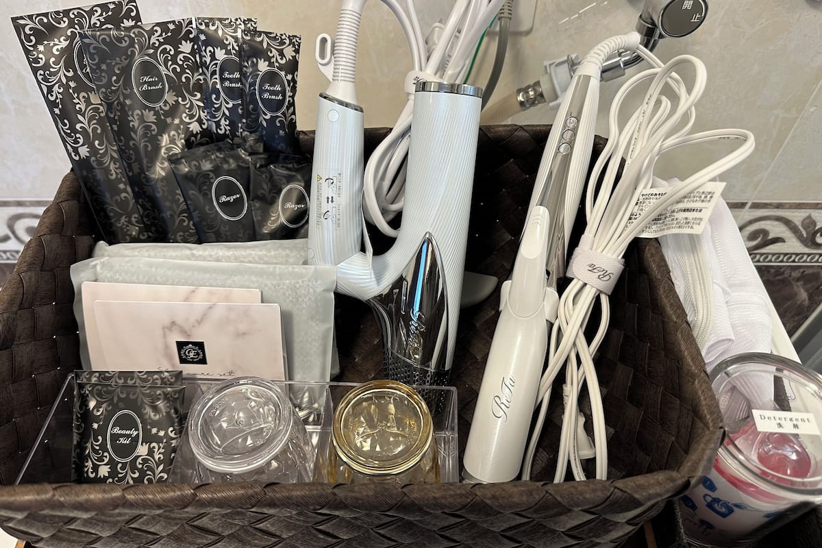 premium suite, 2 bedrooms, hill view | bathroom | separate bathtub and shower, free toiletries, hair dryer, slippers