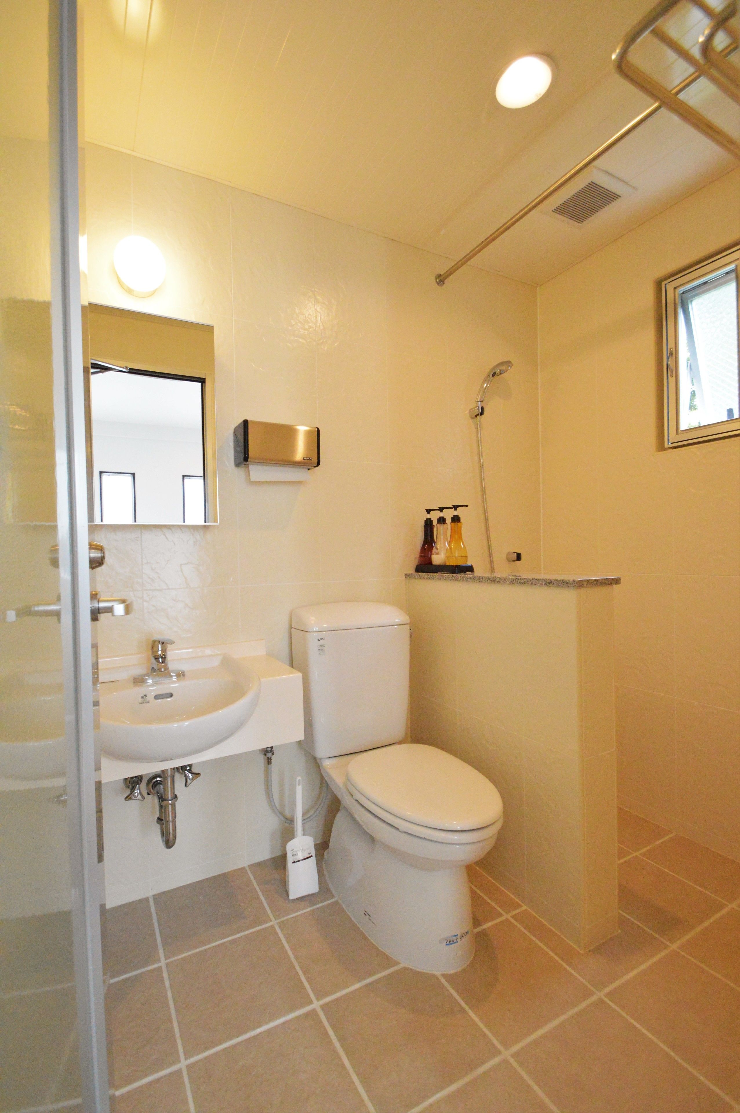 premium suite, 2 bedrooms, hill view | bathroom | separate bathtub and shower, free toiletries, hair dryer, slippers