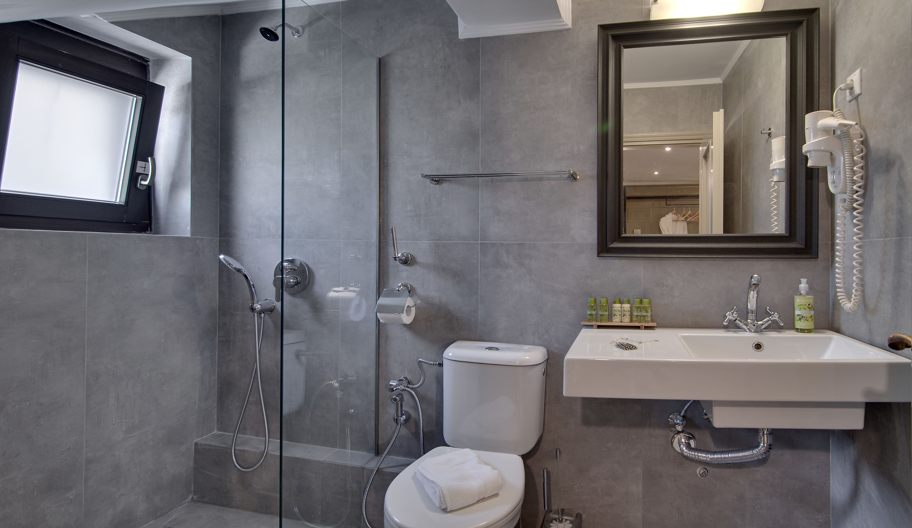 family room, fireplace | bathroom | shower, free toiletries, hair dryer, slippers