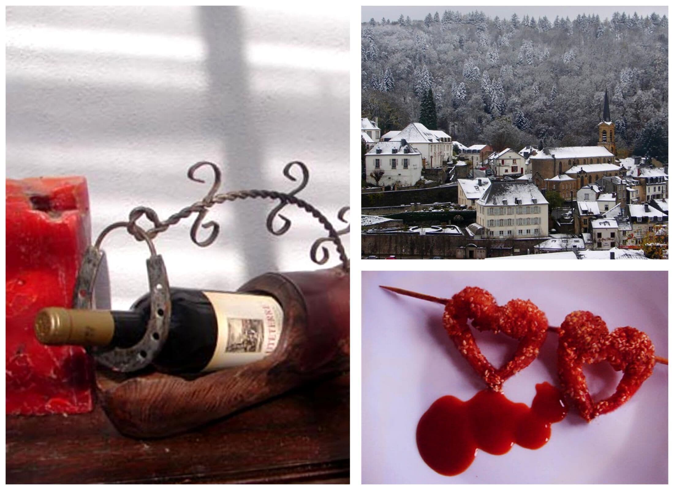 Una botella de vino con un sacacorchos, una decoración en forma de corazón hecha de material rojo, y una escena nevada de un pueblo con edificios y una iglesia.