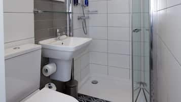 Shower, free toiletries, hair dryer, towels