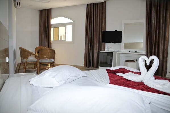 Hochwertige Bettwaren, Minibar, Zimmersafe, Verdunkelungsvorhänge