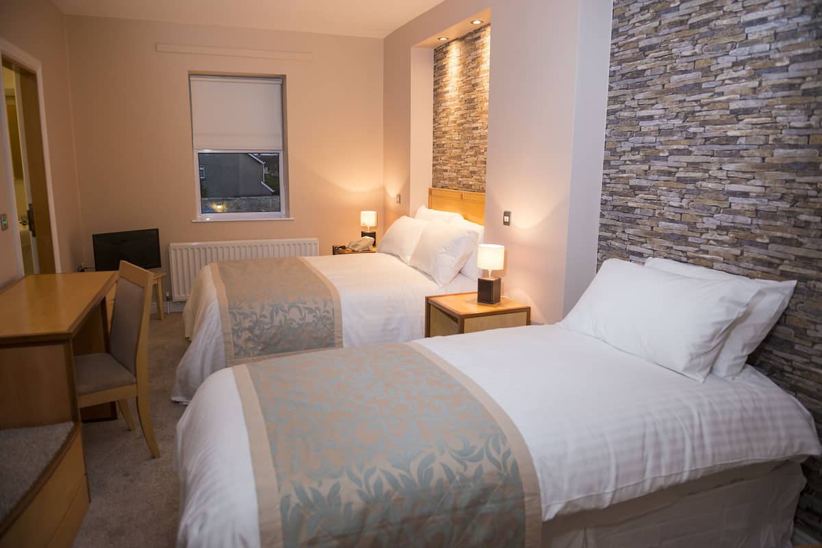 Desk, iron/ironing board (on request), WiFi (free), bed sheets