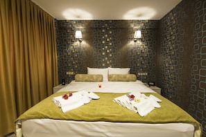 Ropa de cama de alta calidad y minibar