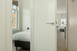 Apartment, 2 Bedrooms (3 single beds) | 2 bedrooms, iron/ironing board, free cribs/infant beds, free WiFi