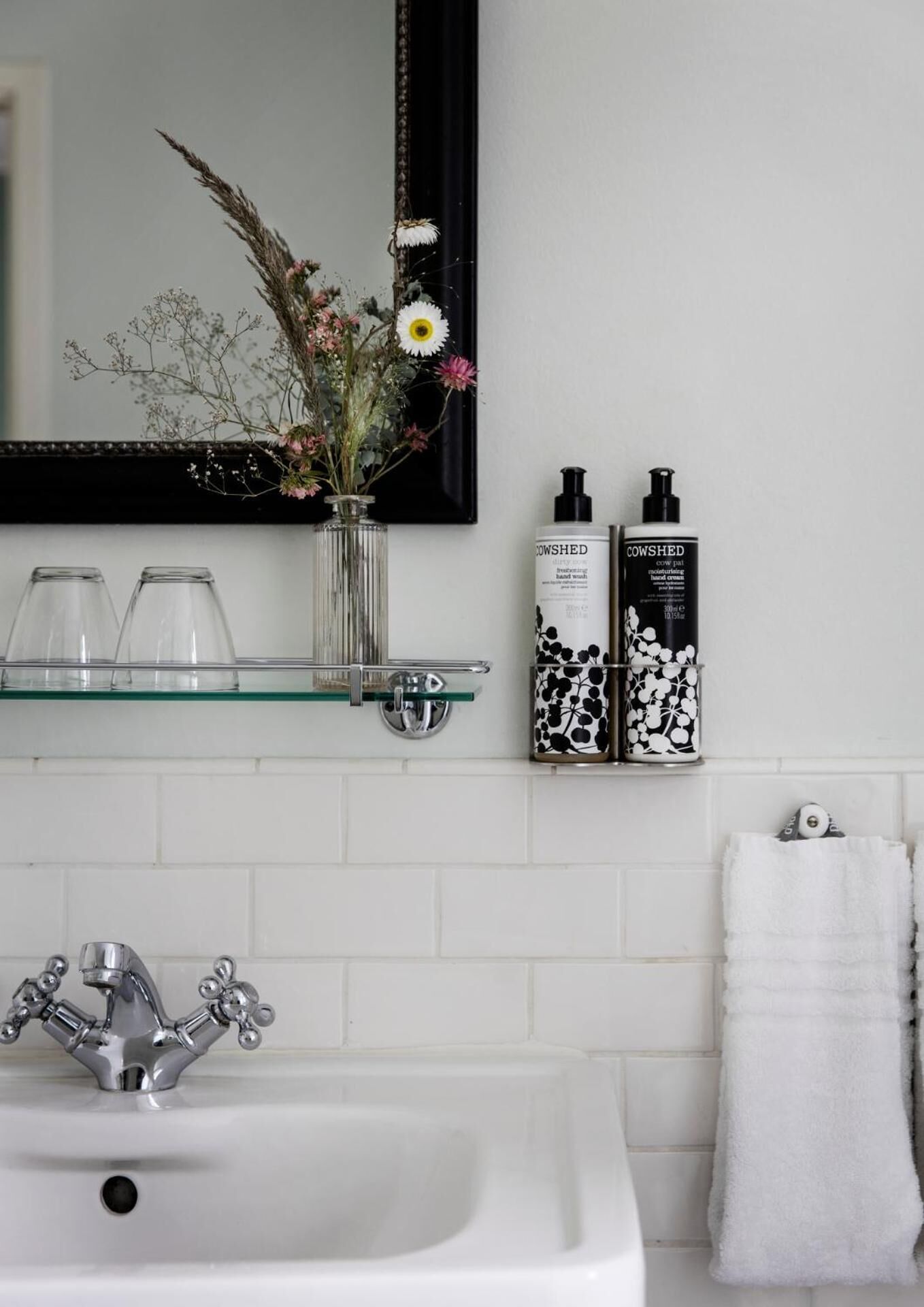 shower, designer toiletries, hair dryer, towels