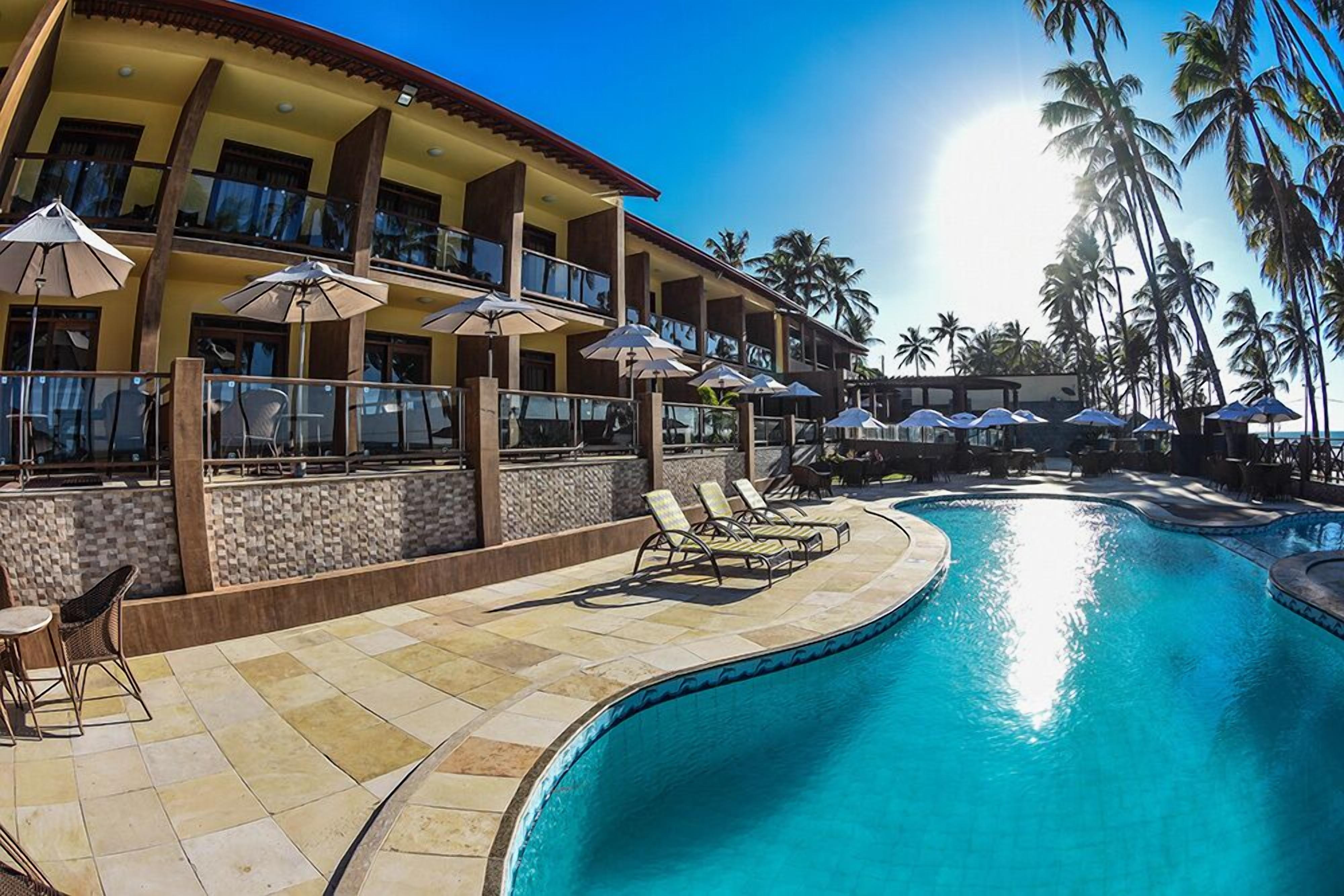 outdoor pool, pool umbrellas, pool loungers