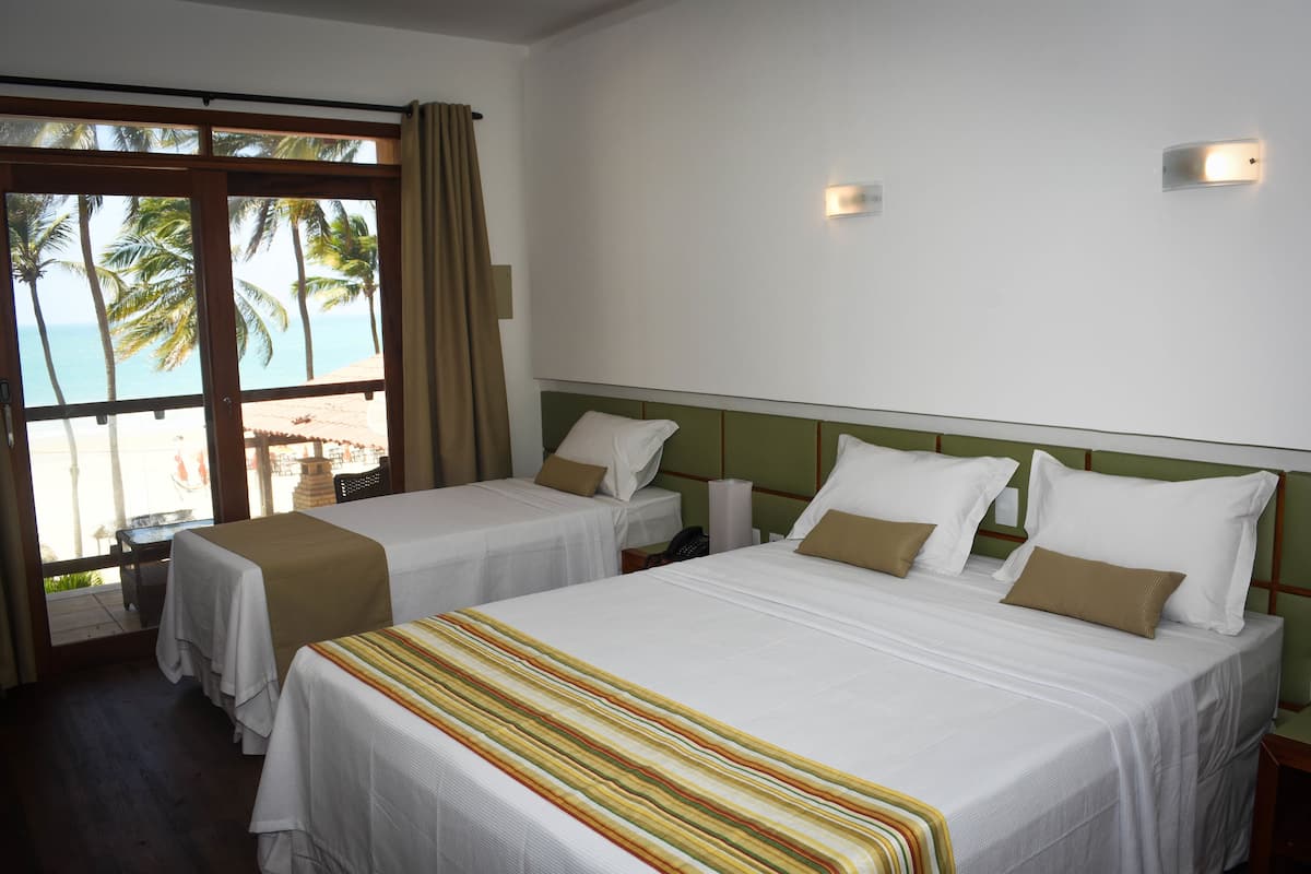 Triple Room | Minibar, desk, blackout curtains, cots/infant beds
