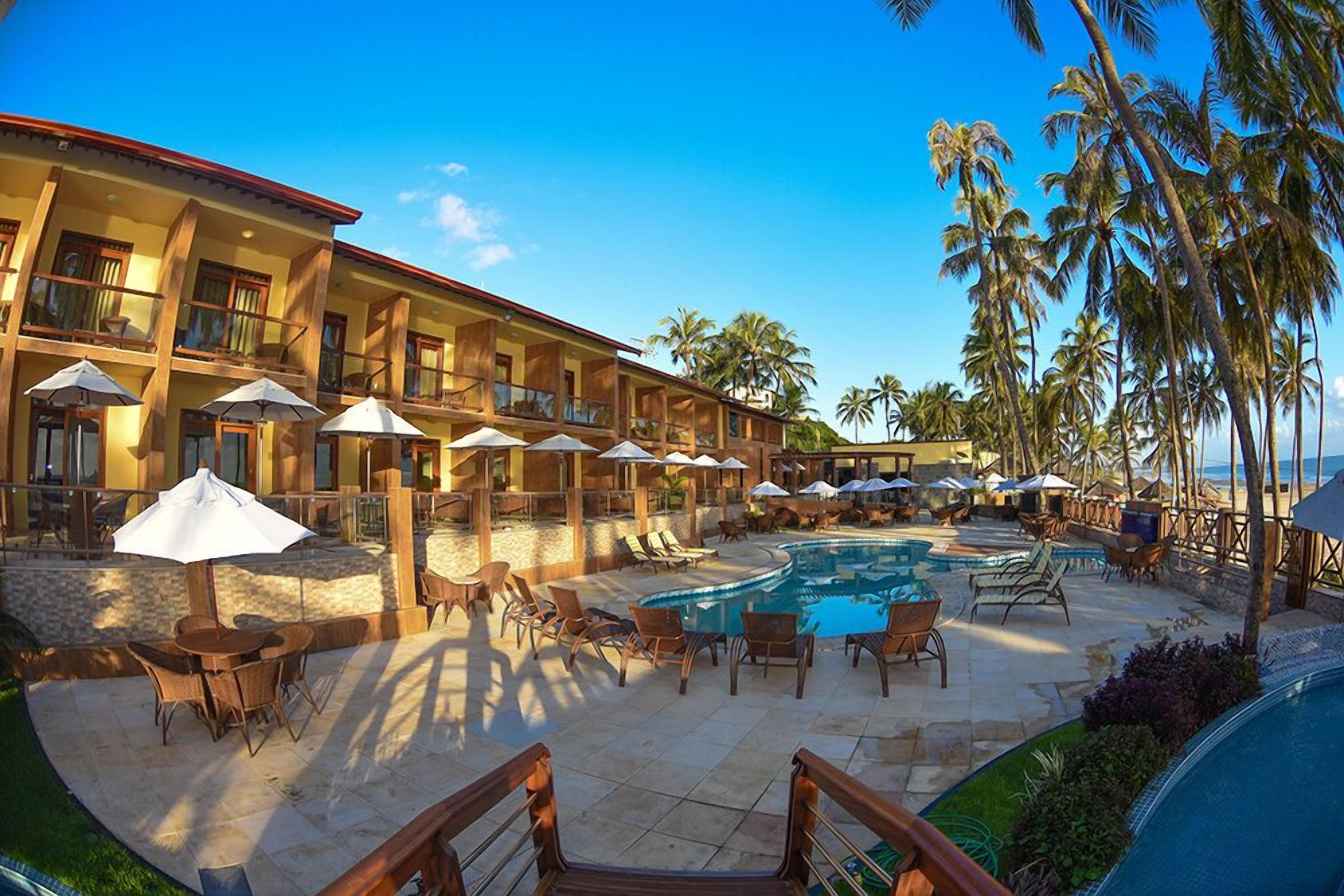 outdoor pool, pool umbrellas, pool loungers