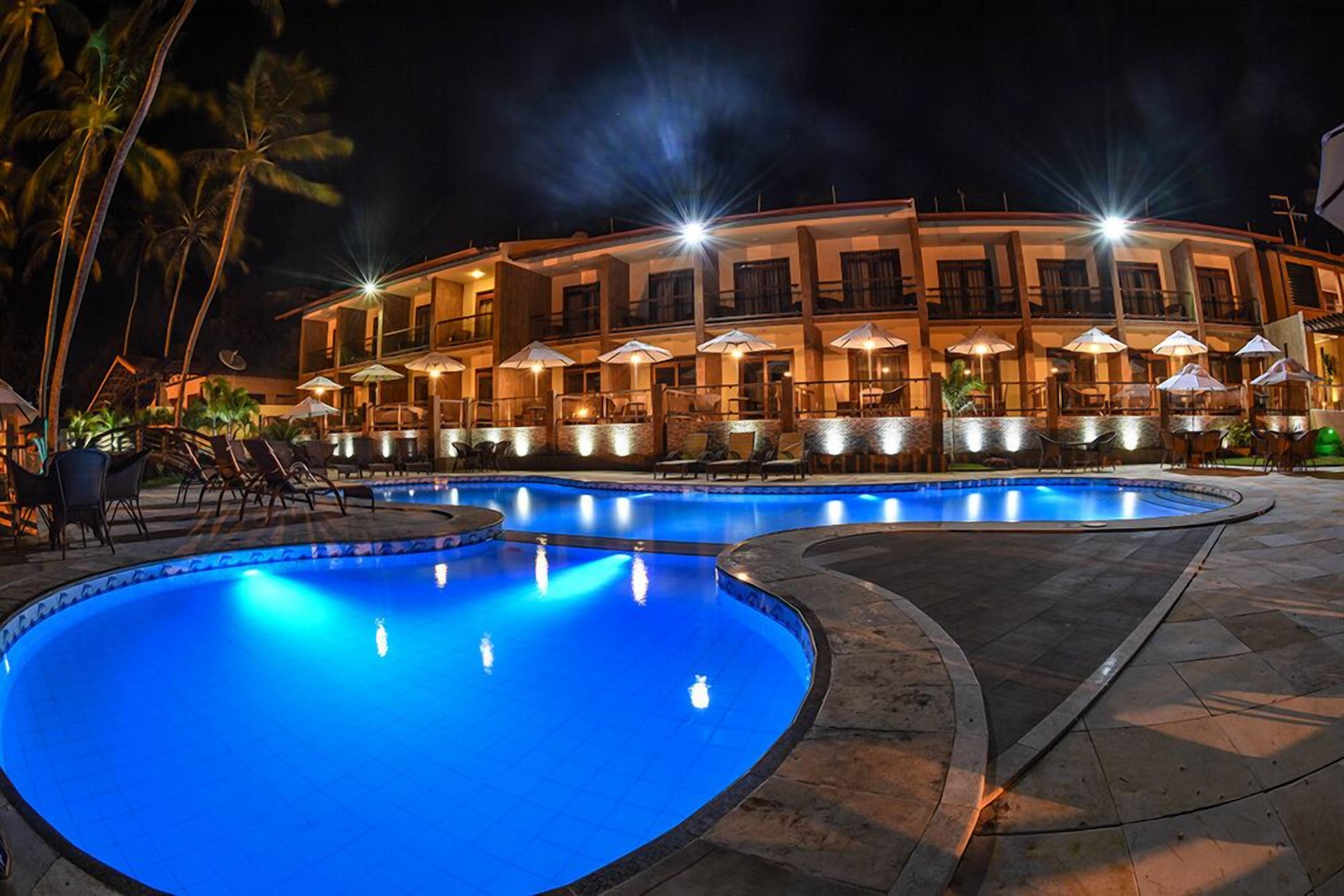 outdoor pool, pool umbrellas, pool loungers