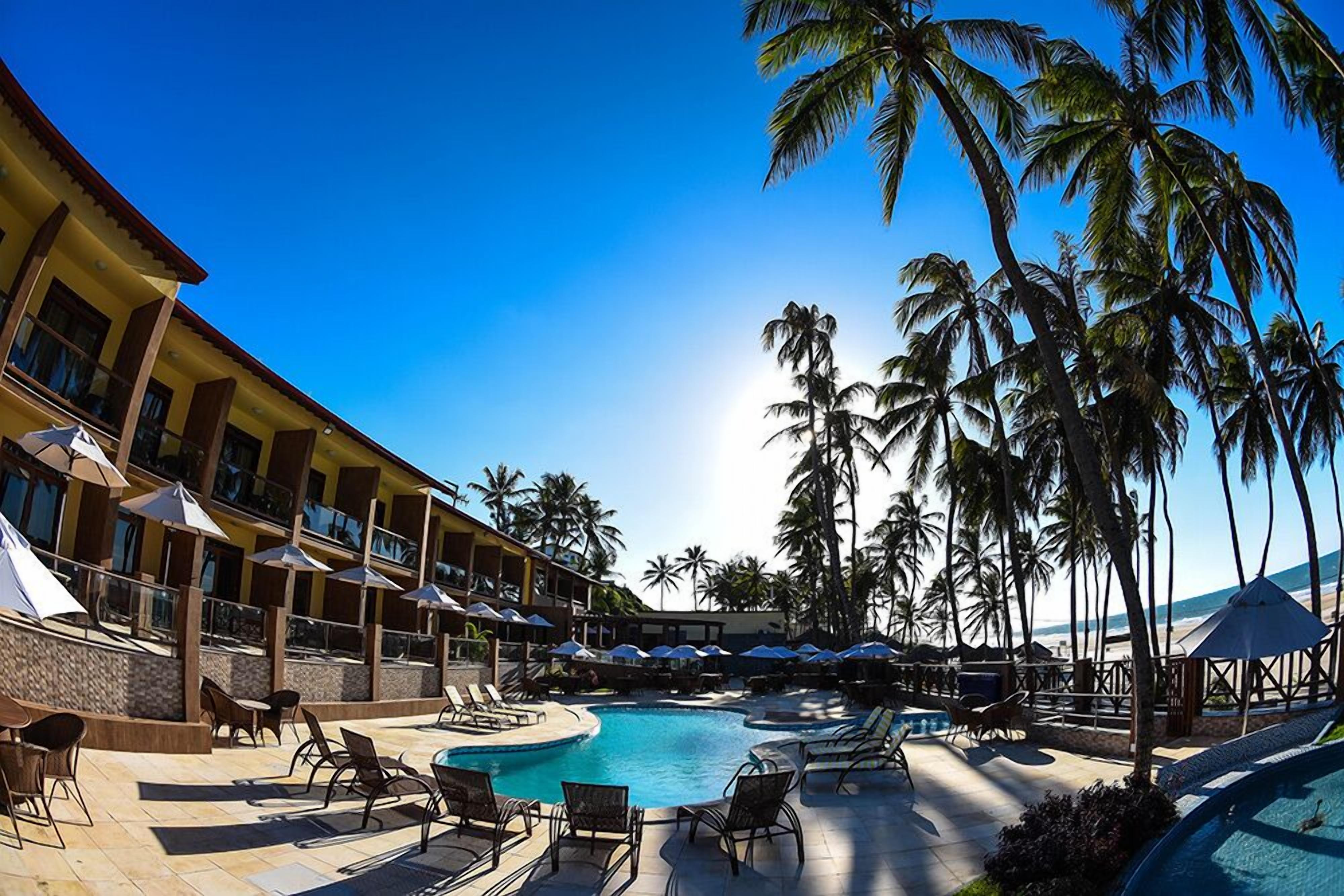 outdoor pool, pool umbrellas, pool loungers