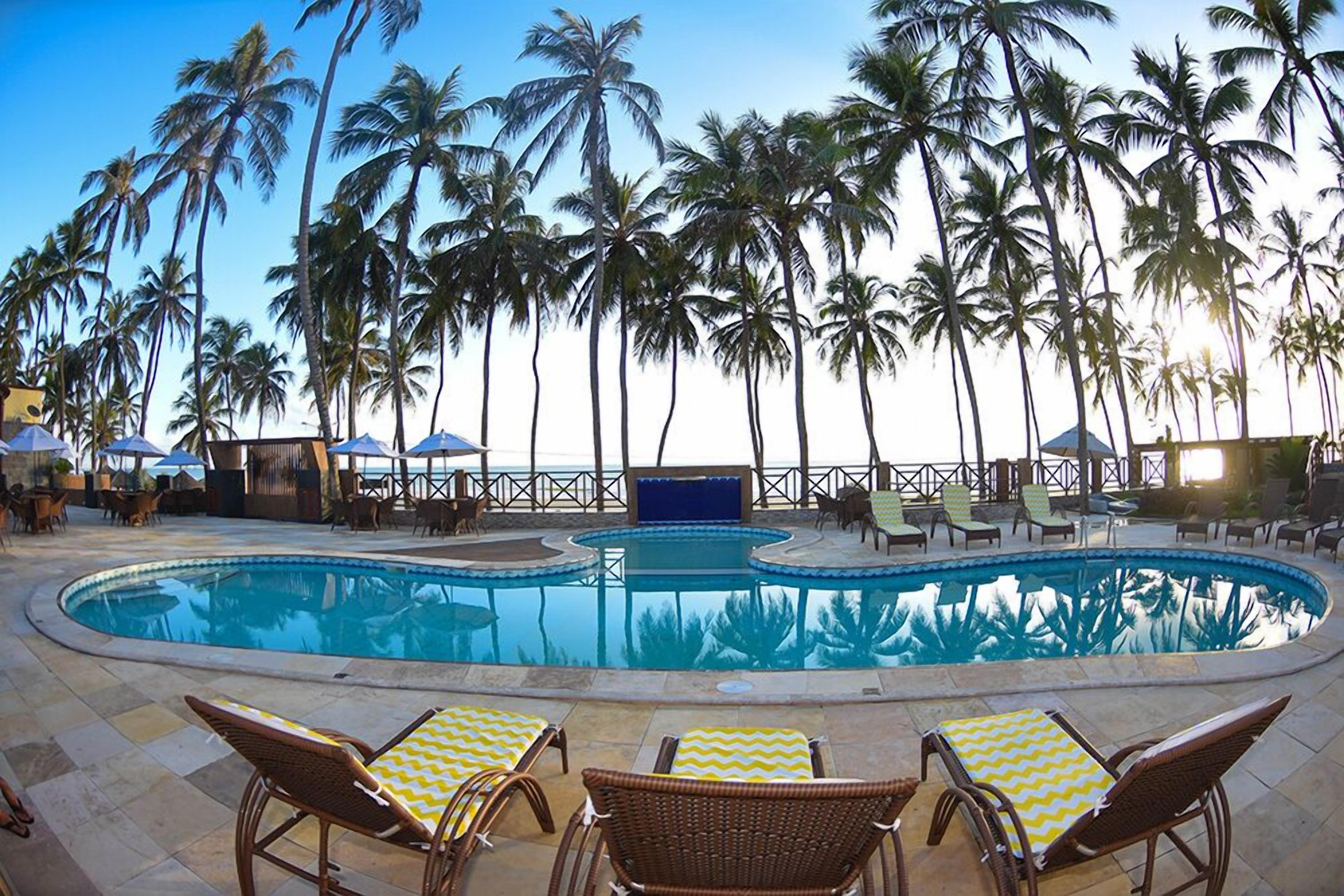 outdoor pool, pool umbrellas, pool loungers