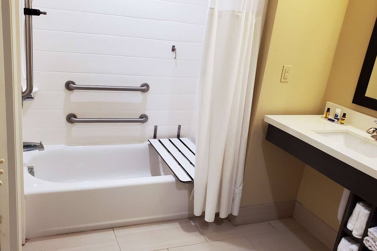 standard room, 2 queen beds, accessible, bathtub | bathroom | designer toiletries, hair dryer, towels