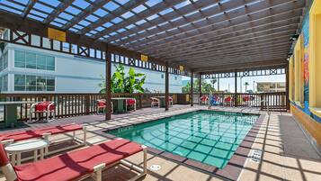 Outdoor pool, open 9:00 AM to 9:00 PM, sun loungers