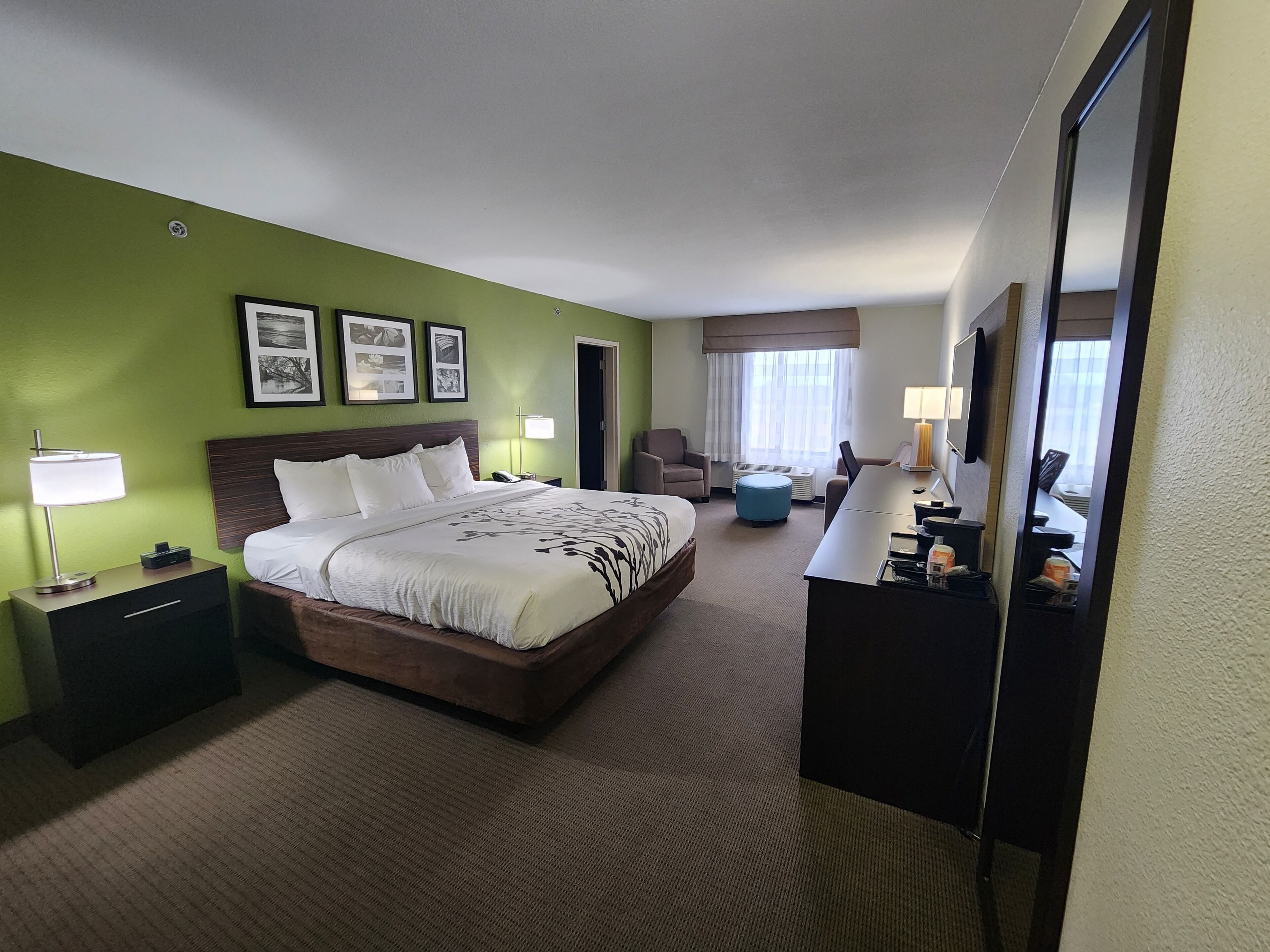 desk, laptop workspace, blackout curtains, iron/ironing board