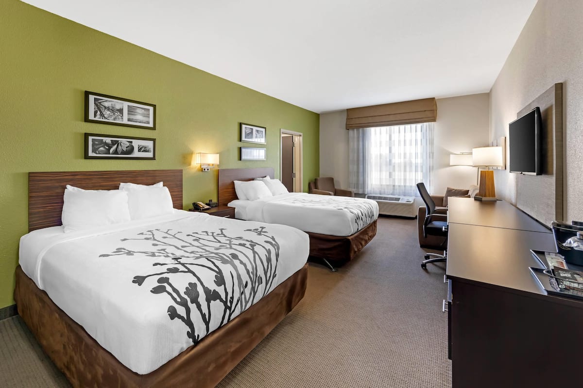 Suite, 2 Queen Beds, Non Smoking (Upgrade) | Desk, laptop workspace, blackout drapes, iron/ironing board