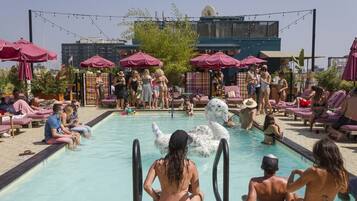 Outdoor pool, pool umbrellas, sun loungers