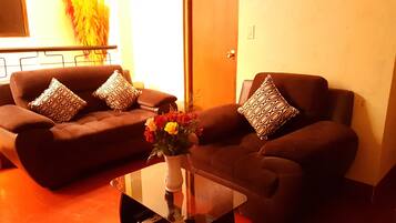 Triple Room, Private Bathroom | Living room | 30-inch flat-screen TV with satellite channels, TV
