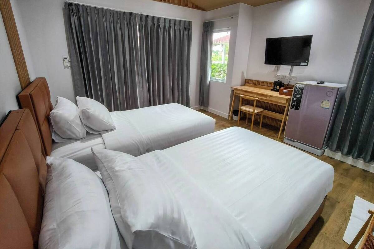 Habitación estándar con 2 camas individuales | Minibar, camas supletorias, wifi gratis