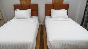 Habitación estándar con 2 camas individuales | Minibar, camas supletorias, wifi gratis