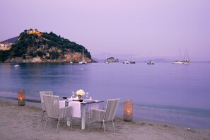 On the beach, sun loungers, beach umbrellas, beach towels