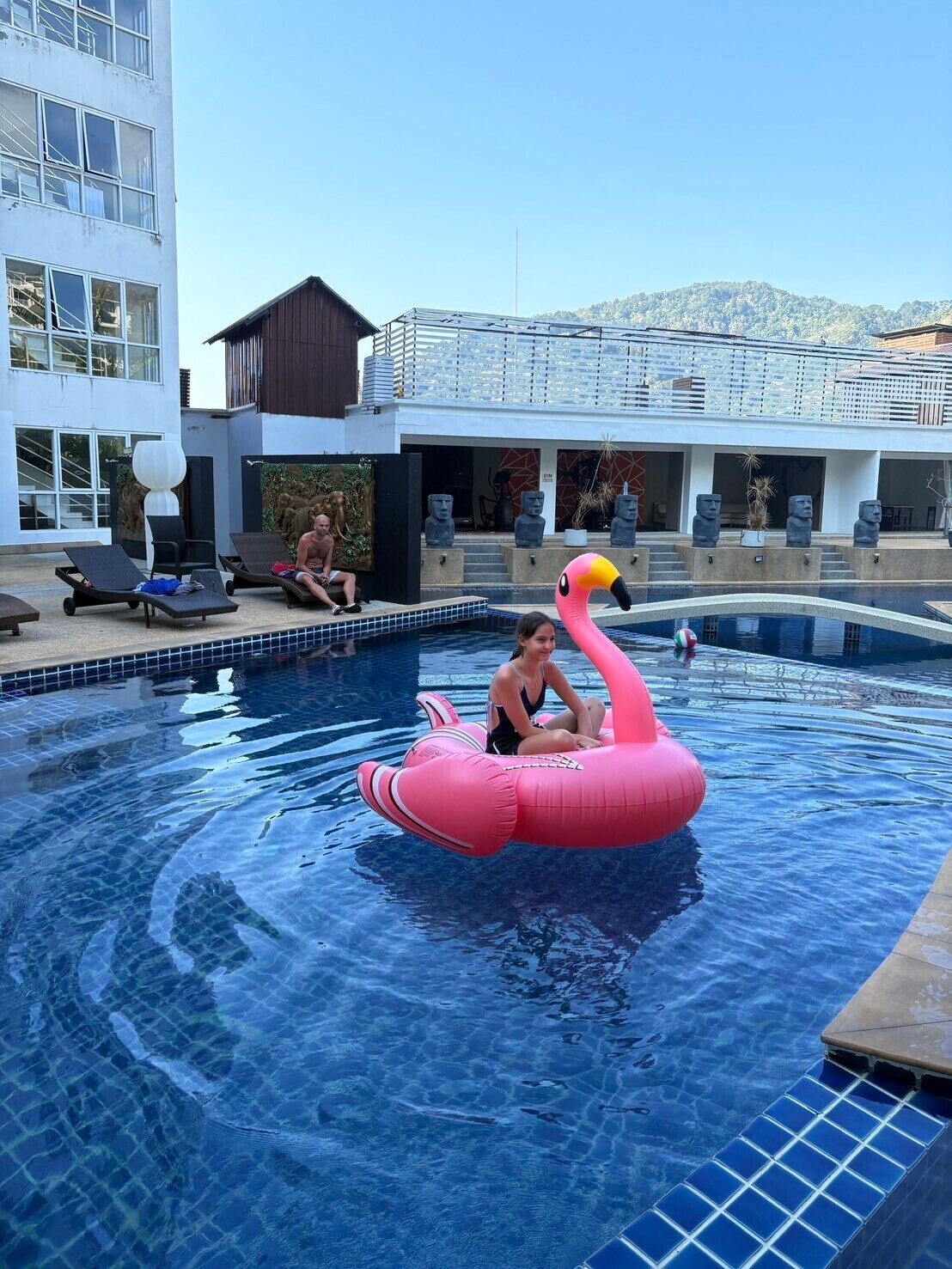 2 outdoor pools, open 6:00 AM to 9:00 PM, pool loungers