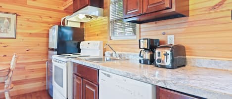 Deluxe Cottage, 1 Bedroom | Private kitchen | Full-size fridge, microwave, stovetop, coffee/tea maker