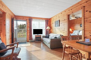 Deluxe Cottage, 3 Bedrooms | Living area | 39-inch LCD TV with cable channels, TV