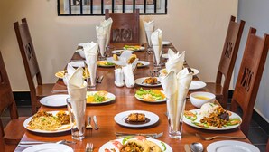 2 restaurants; breakfast, lunch, and dinner served - The Okaseni Lodge (Arusha)