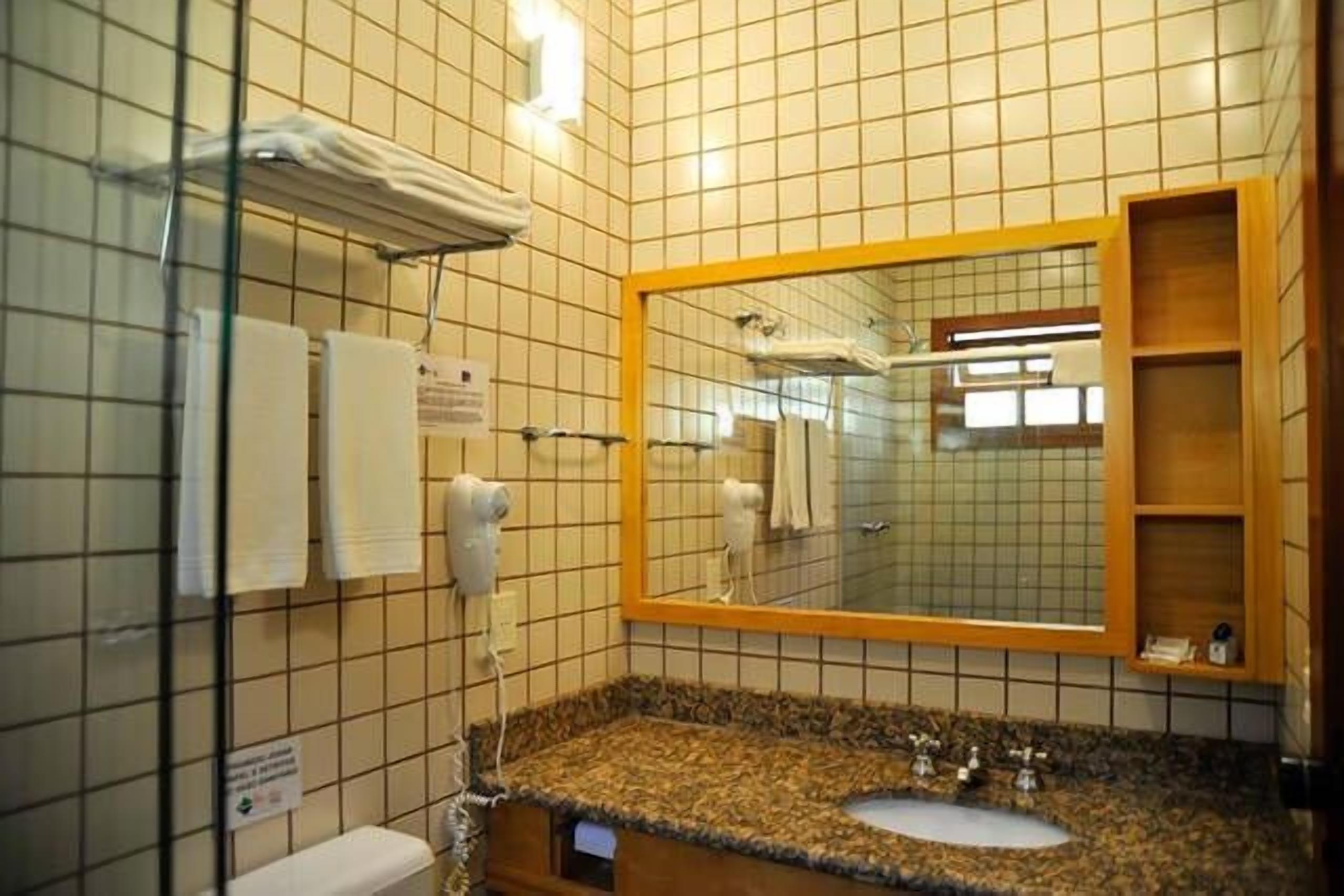 hair dryer, bidet, towels