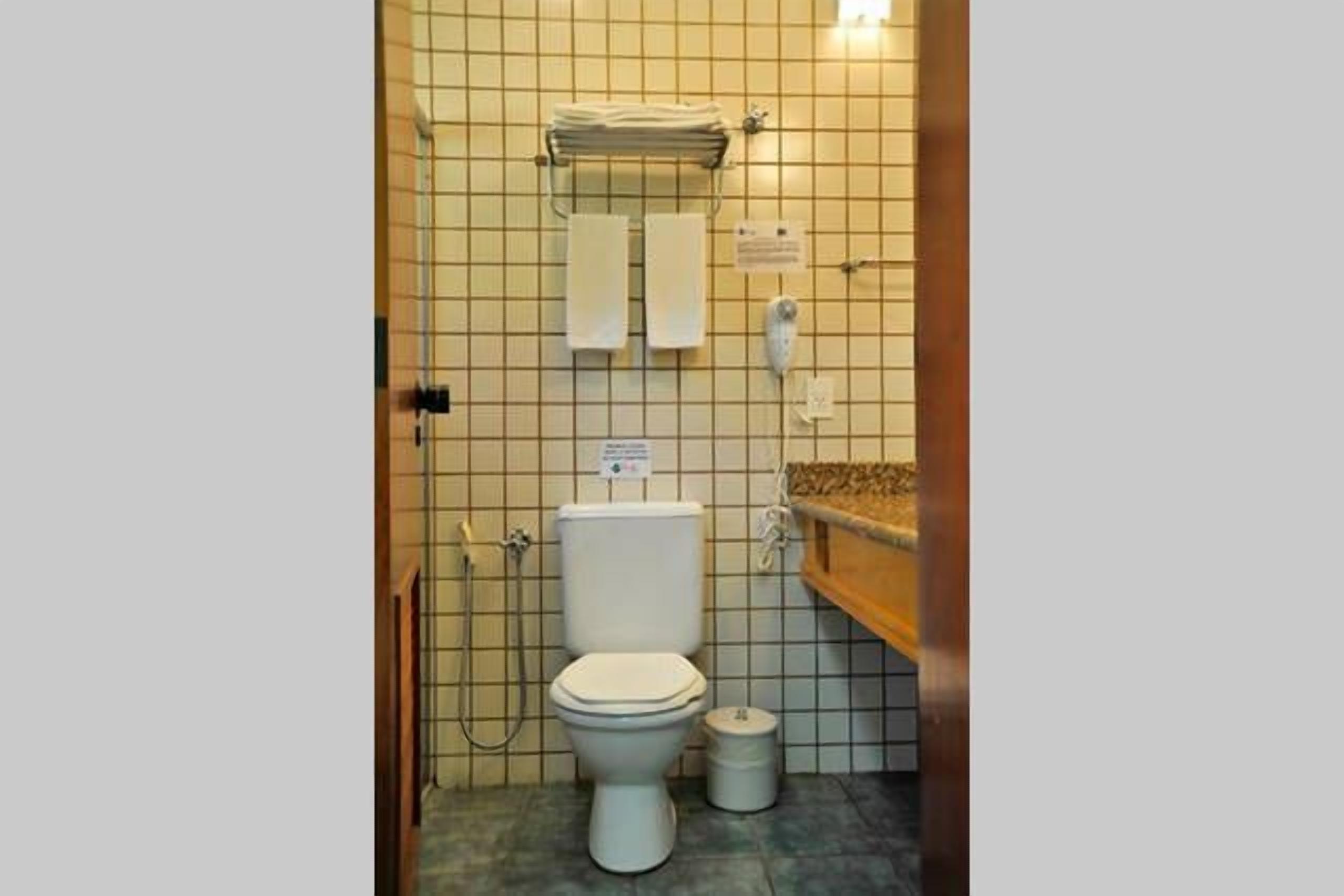 hair dryer, bidet, towels