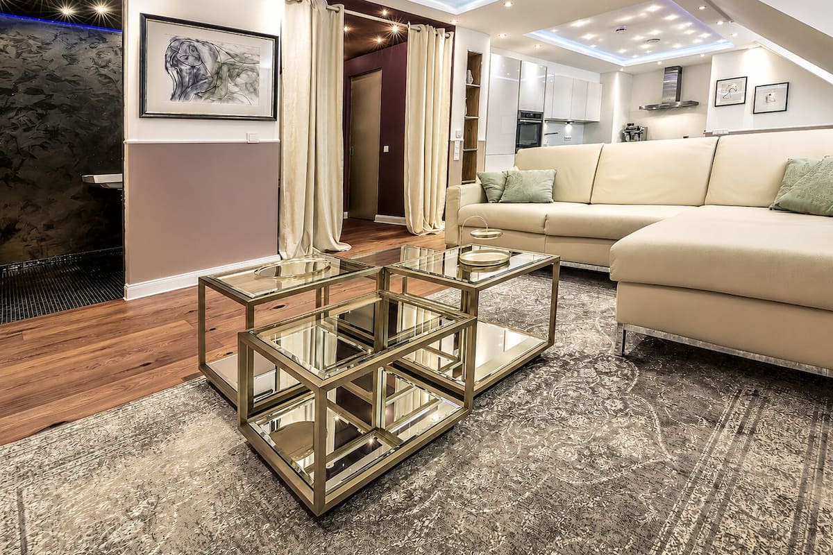 One-Bedroom Residential Suite | Living area | 60-inch LED TV with satellite channels, TV, Netflix