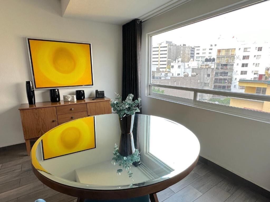 luxury suite, 2 bedrooms | living area | 50-inch flat-screen tv with cable channels, tv