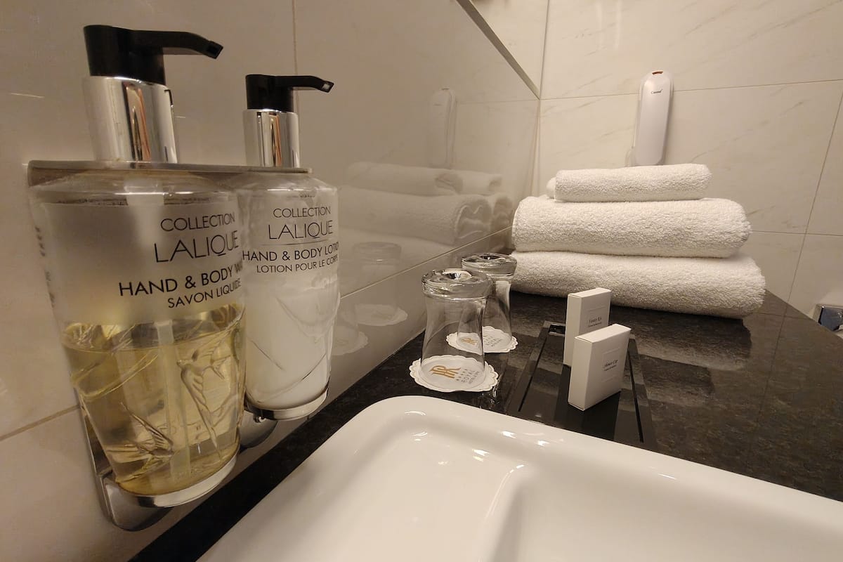 premier double room single use | bathroom | free toiletries, hair dryer, bathrobes, slippers