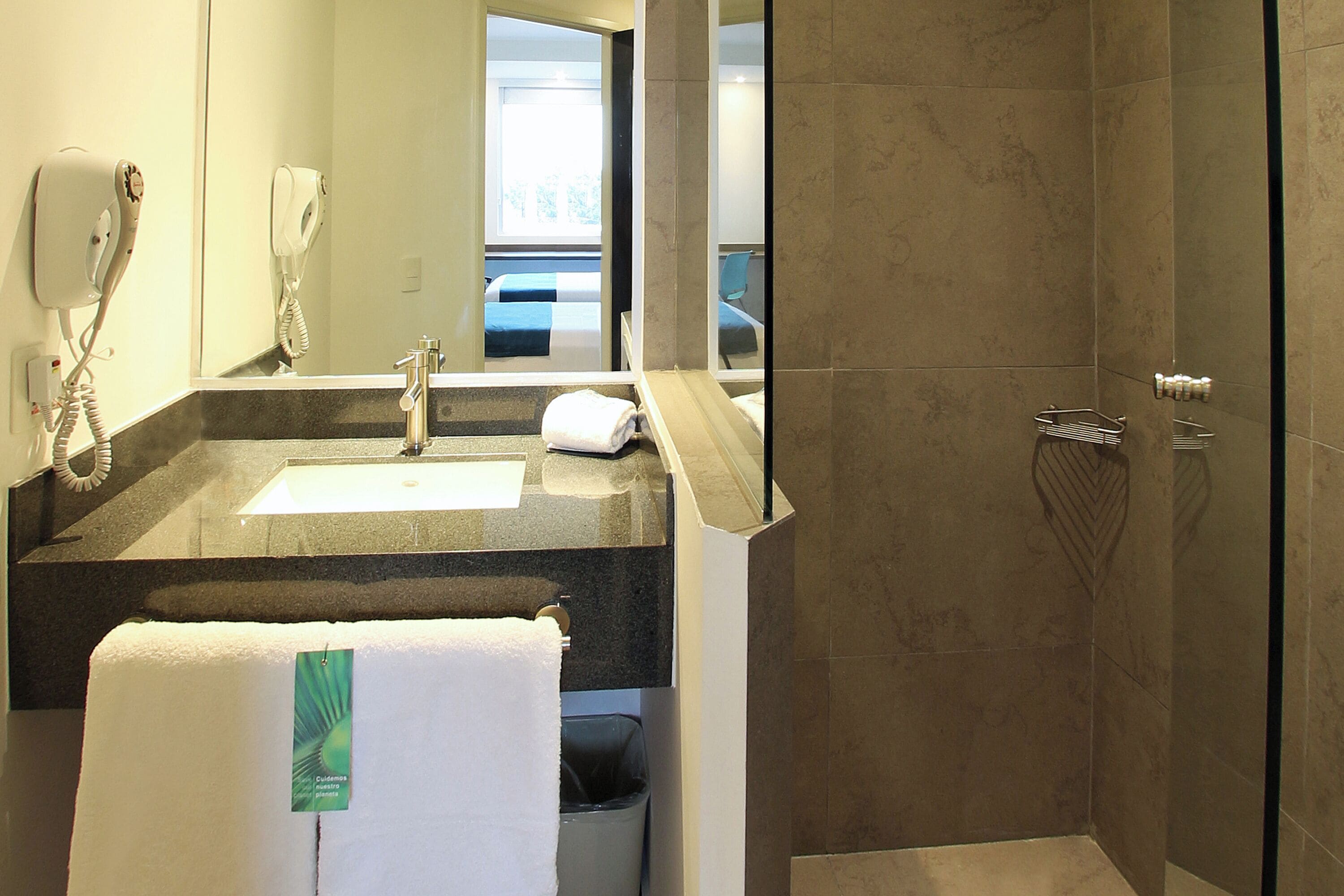 shower, free toiletries, hair dryer, towels