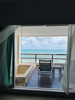 Ocean Front Suite | Living area | 60-inch Smart TV with cable channels