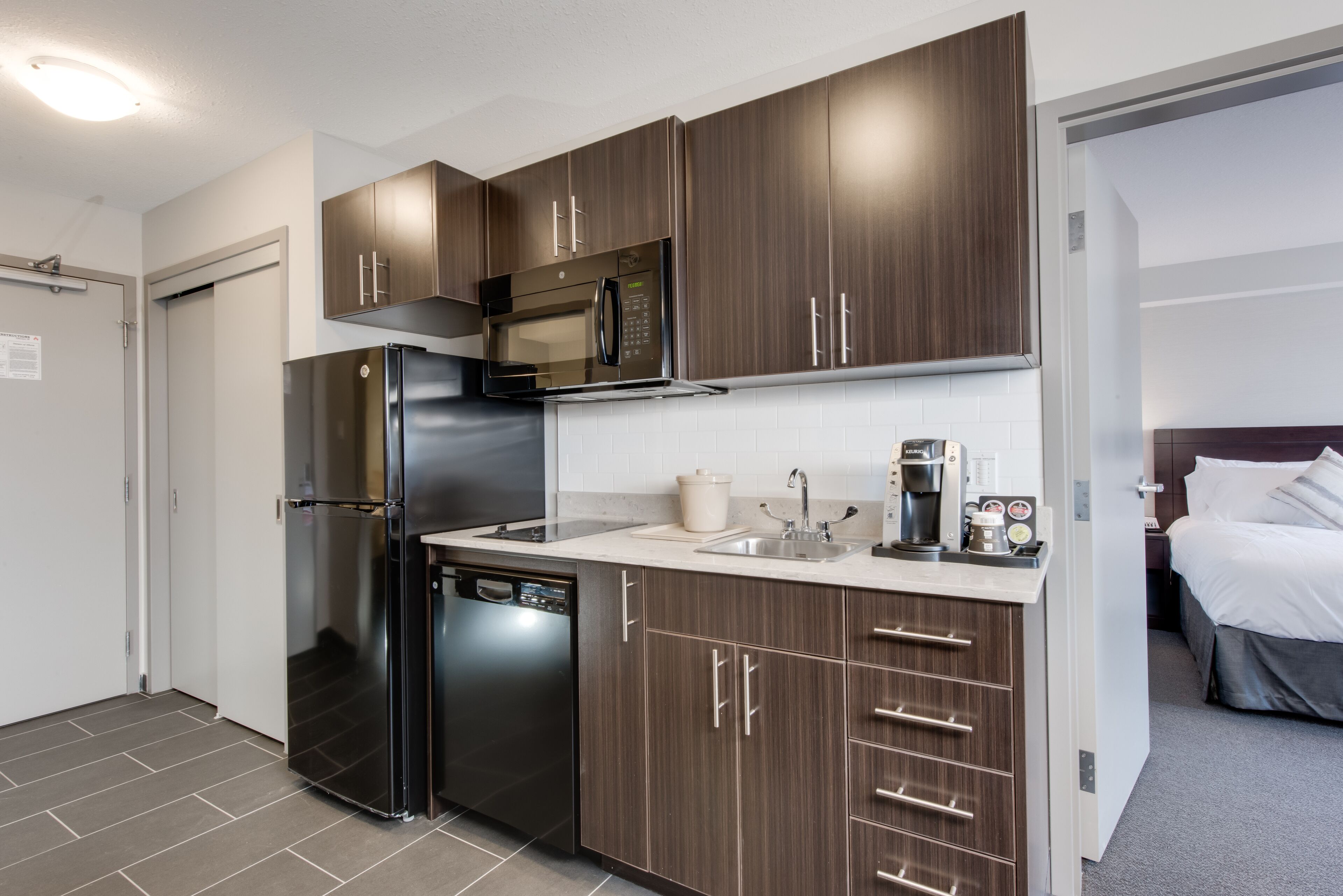 Suite, 1 King Bed, Non Smoking (One-Bedroom) | Private kitchen | Fridge, microwave, coffee/tea maker