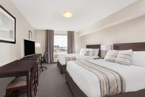 Room, 2 Queen Beds, Non Smoking | In-room safe, desk, laptop workspace, blackout drapes - Ramada by Wyndham Grassland (Grassland)